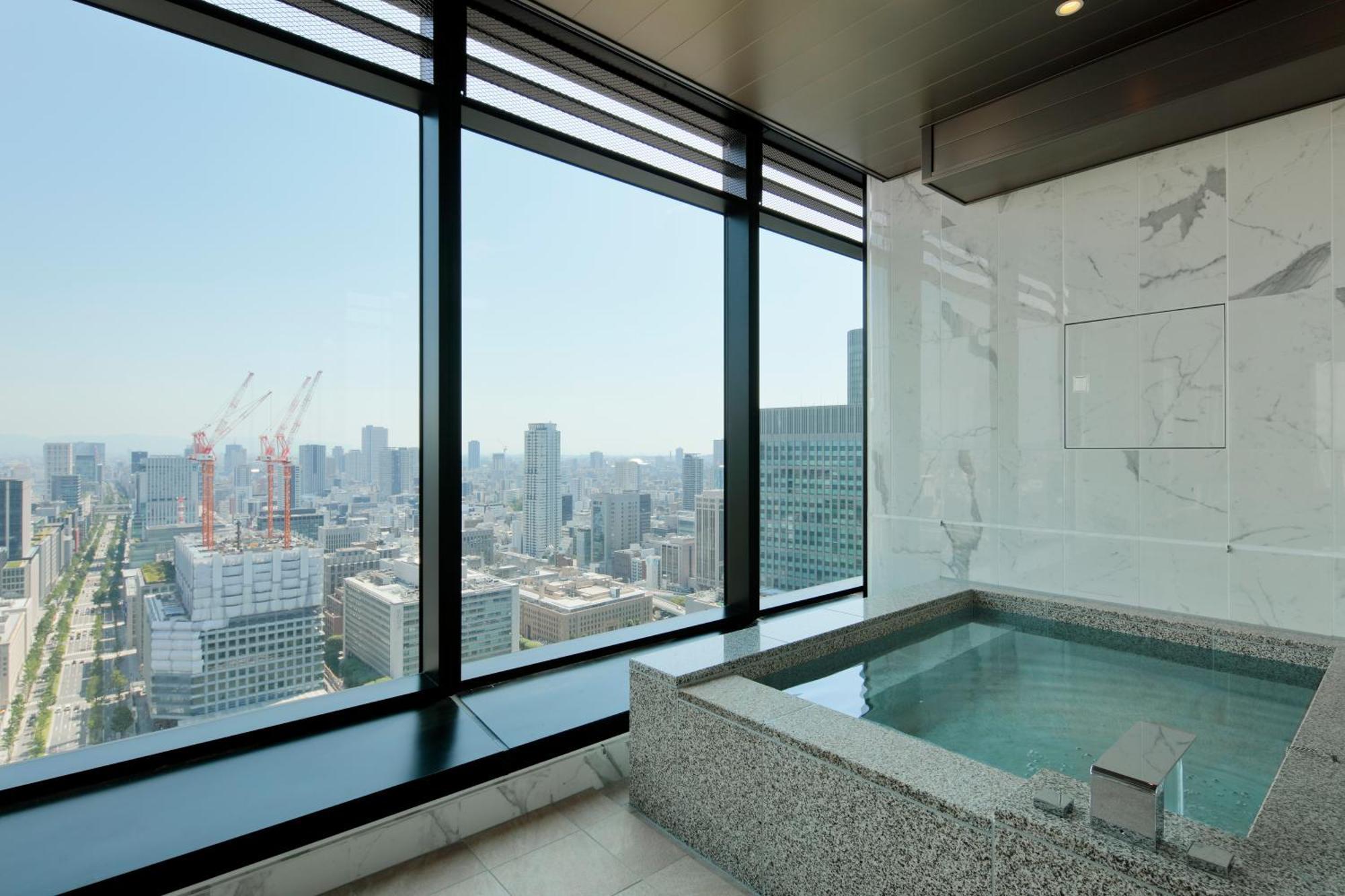 Candeo Hotels Osaka The Tower Экстерьер фото A private onsen at the Ritz-Carlton, Osaka